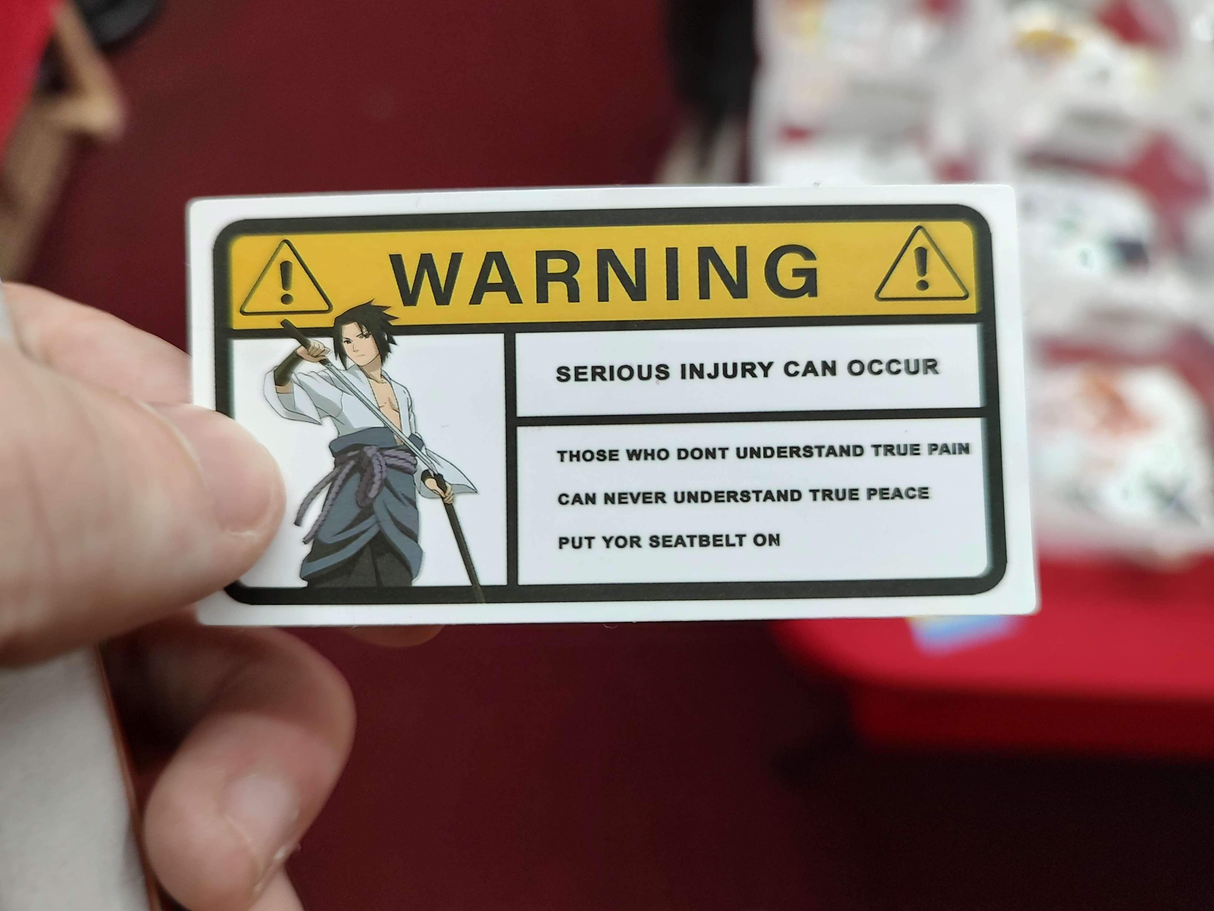 an anime warning sticker